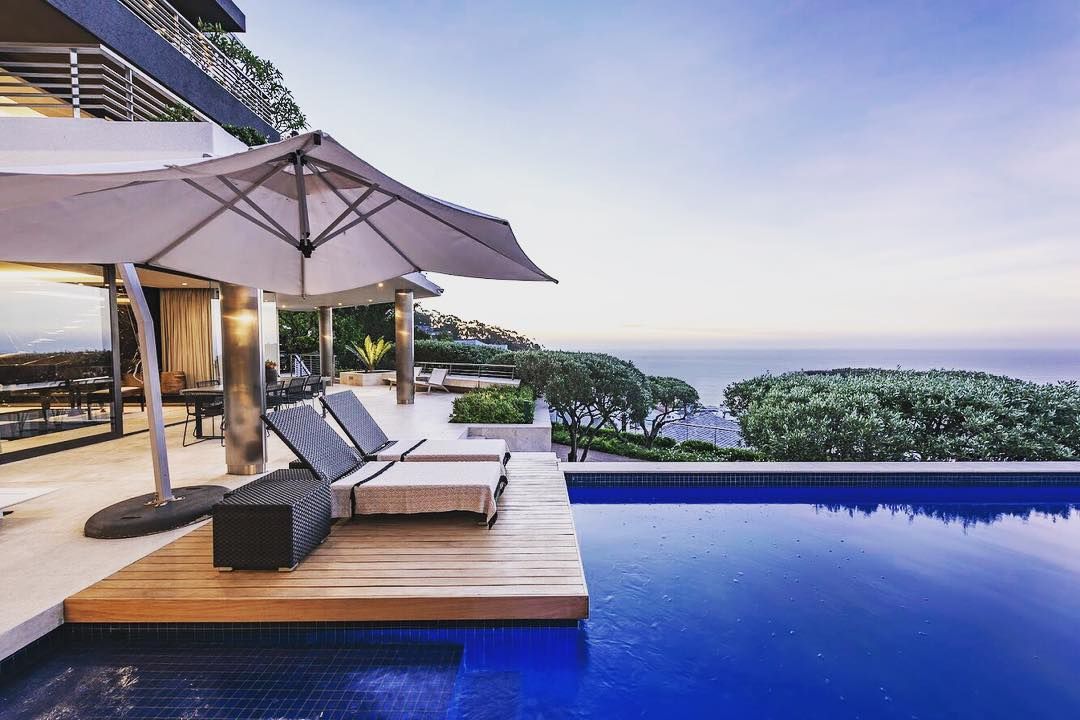 Image may contain: Moondance Villa, Made in Chelsea, house, location, South Africa, Cape Town, cost, booking, price,  Swimming Pool, Tent, Resort, Hotel, Pool, Water, Building