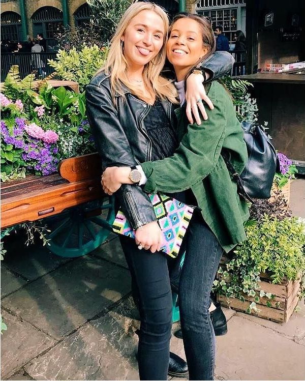 Image may contain: Vegetation, Outdoors, Shoe, Female, Denim, Jeans, Coat, Jacket, Face, Footwear, Vase, Jar, Potted Plant, Pottery, Plant, Human, Person, Pants, Clothing, Apparel