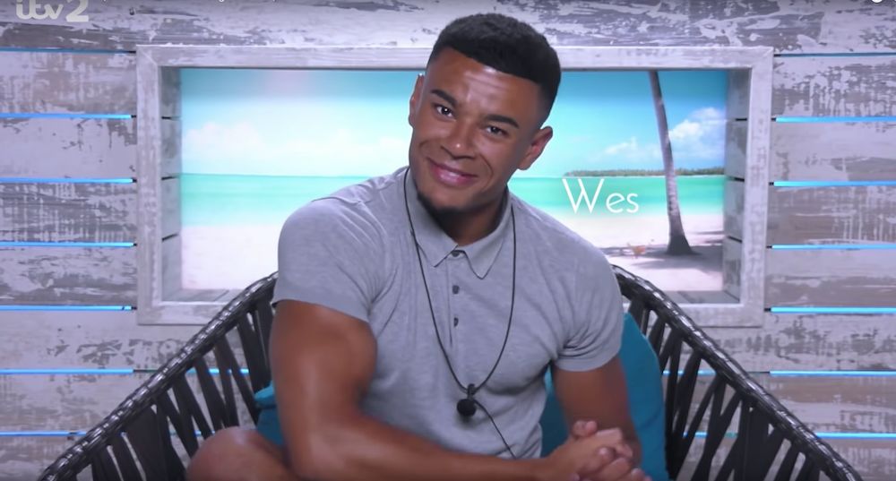 Image may contain: Love Island villa, 2019, Love Island, location, Video Gaming, Outdoors, Face, Chair, Furniture, People, Human, Person