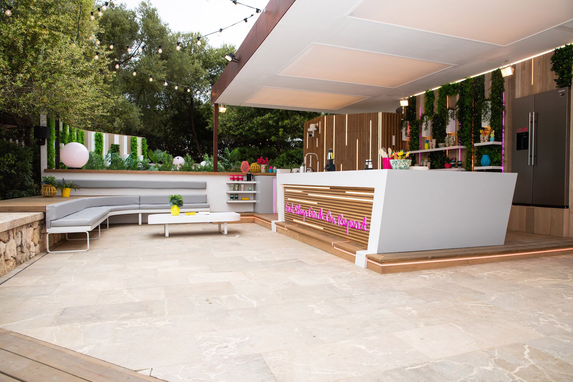 Image may contain: Love Island villa, Love Island, 2019, location, Sant Llorenç des Cardassar, Wood, Couch, Human, Person, Flooring, Reception, Table, Furniture