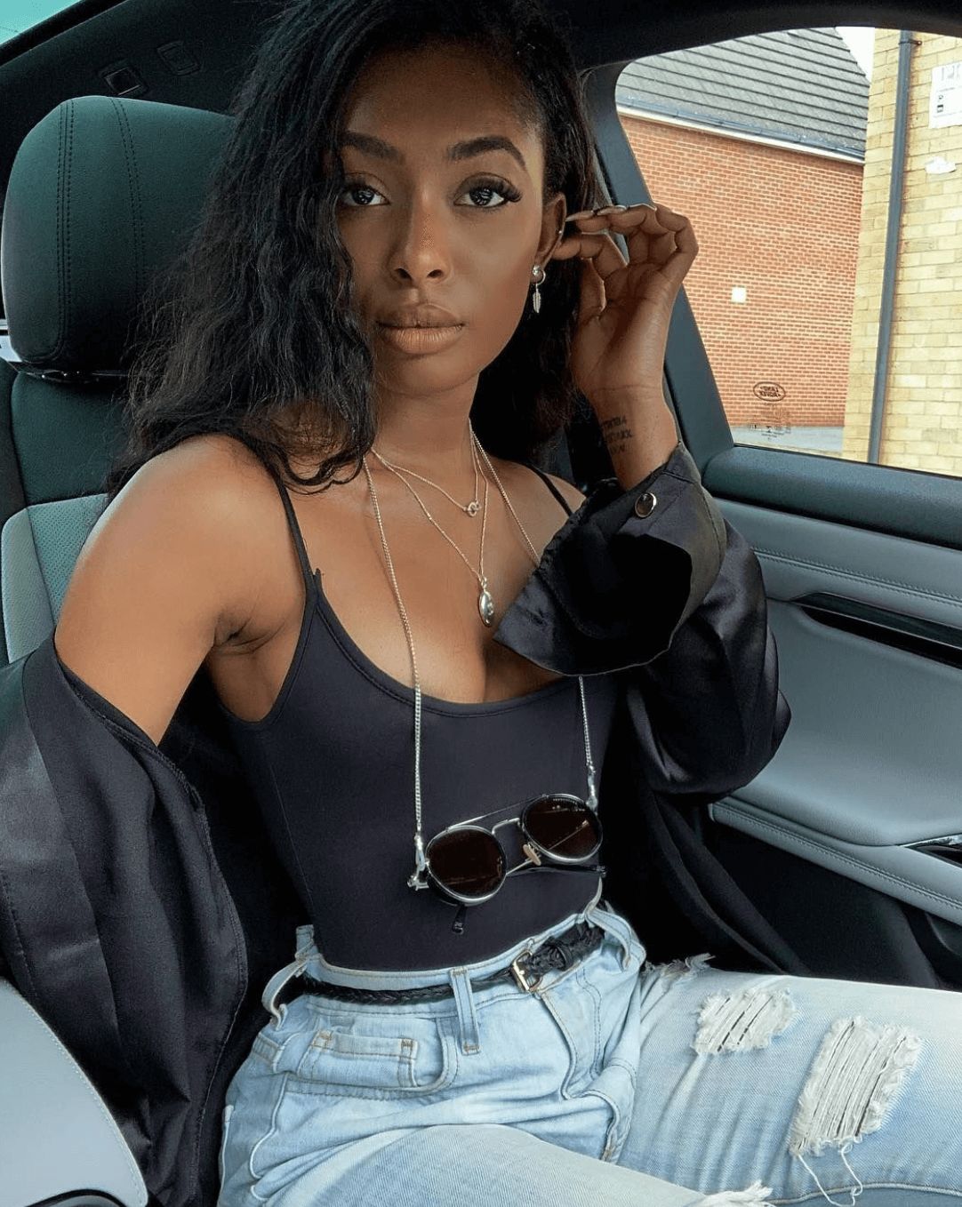 Image may contain: Casa Amor cast, Casa Amor, Love Island, Jourdan Riane, contestant, cast, Islander, new, girl, Instagram, age, job, Belt, Headrest, Accessory, Accessories, Person, Human, Cushion