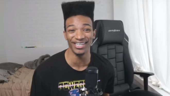 Image may contain: Etika, Desmond Amofah, YouTuber, YouTube, vlog, gaming, found, dead, body, death, Nintendo, Twitch, missing, news, updates, Crowd, Dating, Cushion, Face, Human, Person