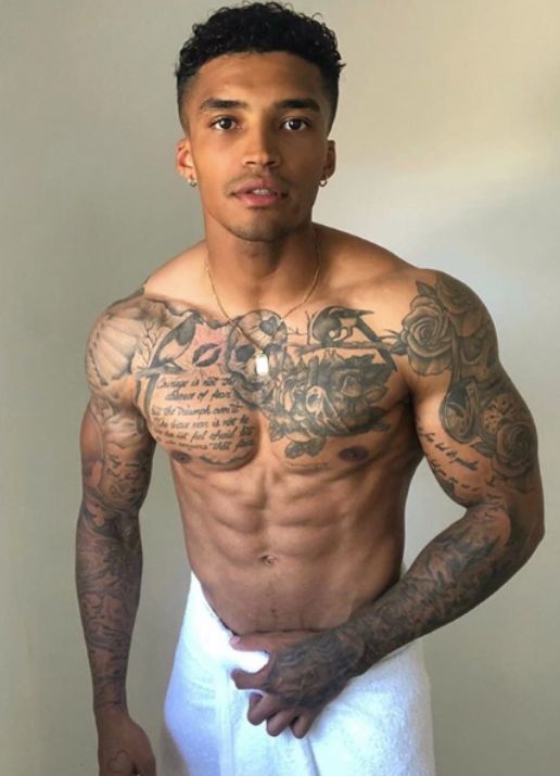 Image may contain: Face, Man, Tattoo, Human, Person, Skin
