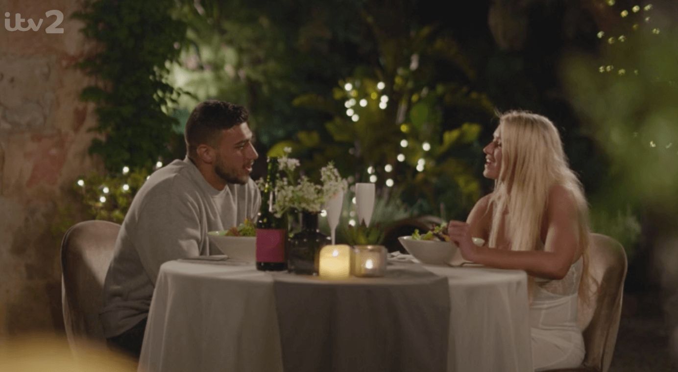 Image may contain: Joe from Love Island, Joe, Love Island, Joe Goldberg, You, Netflix, 2019, Tommy, Lucie, date, red flag, last night, episode, memes,  Glass, Food, Meal, Linen, Dining Table, Dating, Table, Furniture, Home Decor, Person, Human, Tablecloth