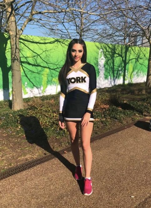 Image may contain: Heel, Outdoors, Path, Girl, Vegetation, Shoe, Footwear, Tree, Plant, Woman, Person, Human, Female, Shorts, Apparel, Clothing