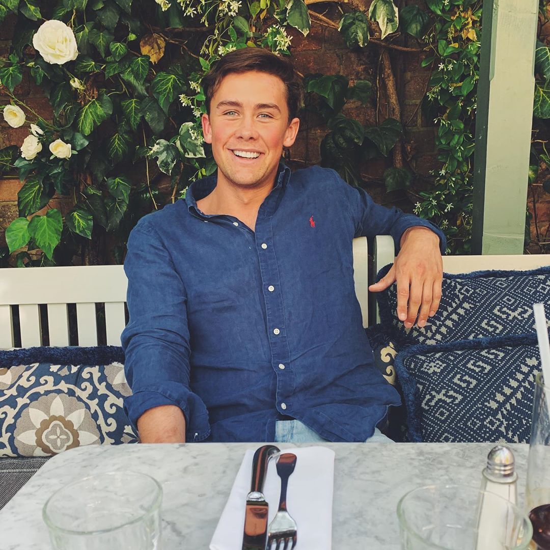 Image may contain: Casa Amor cast, Casa Amor, Love Island, Stevie Bradley, contestant, cast, Islander, new, boy, Instagram, age, job, Linen, Table, Apparel, Clothing, Sleeve, Cushion, Couch, Person, Human, Furniture, Home Decor