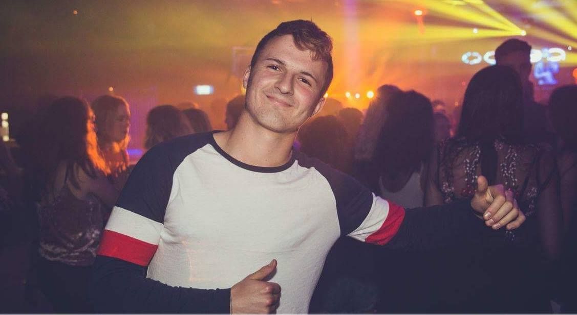 Image may contain: Night Life, Flare, Light, Party, Photography, Portrait, Photo, Crowd, Man, Clothing, Apparel, Night Club, Face, Club, Person, Human