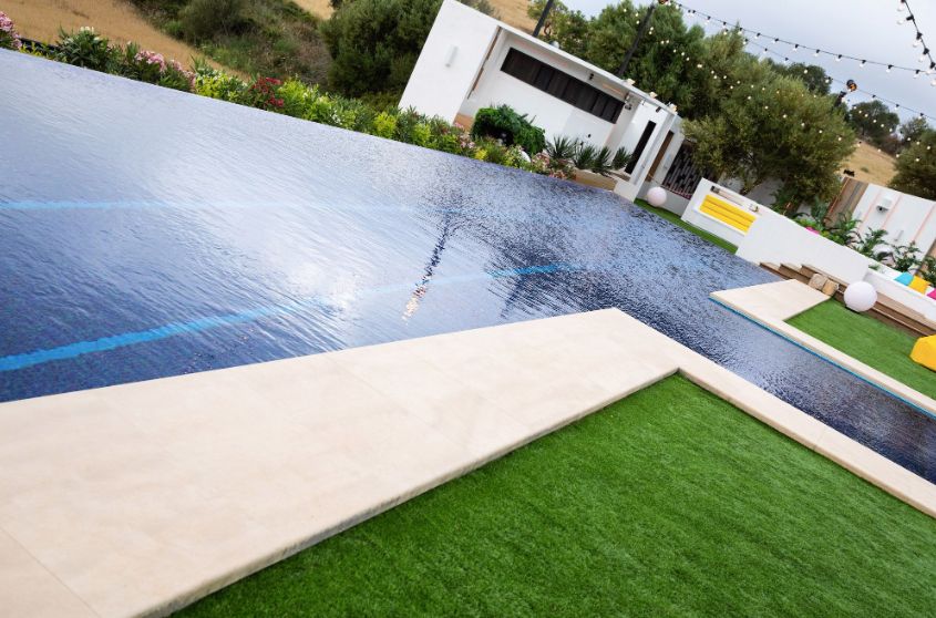 Image may contain: Outdoors, House, Villa, Swimming Pool, Housing, Building, Grass, Plant, Pool, Water