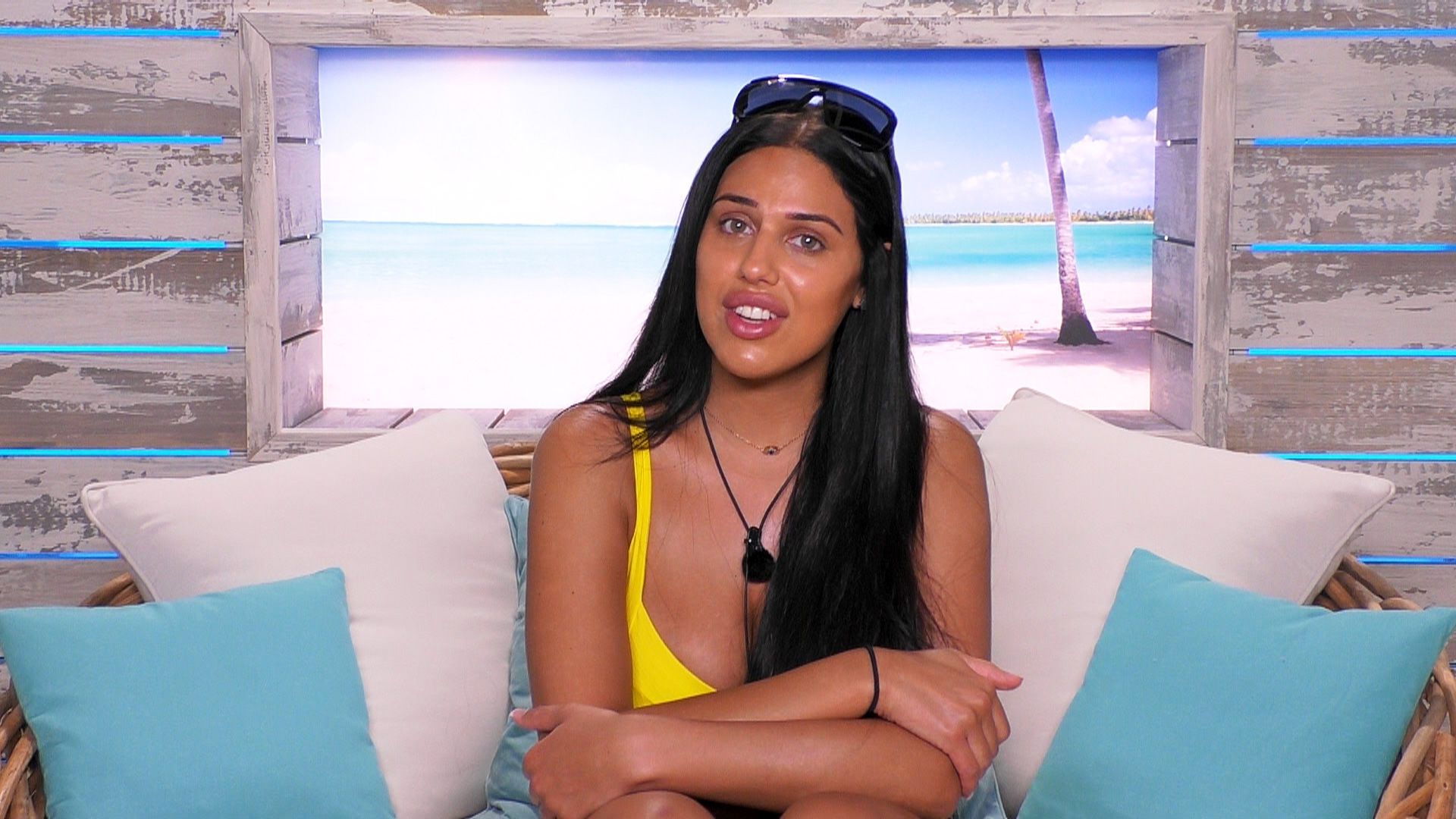 Image may contain: Love Island star signs, Anna, Love Island, star sign, Cancer, compatible, science, Pillow, Clothing, Apparel, Sunglasses, Accessories, Accessory, Couch, Furniture, Cushion, Person, Human