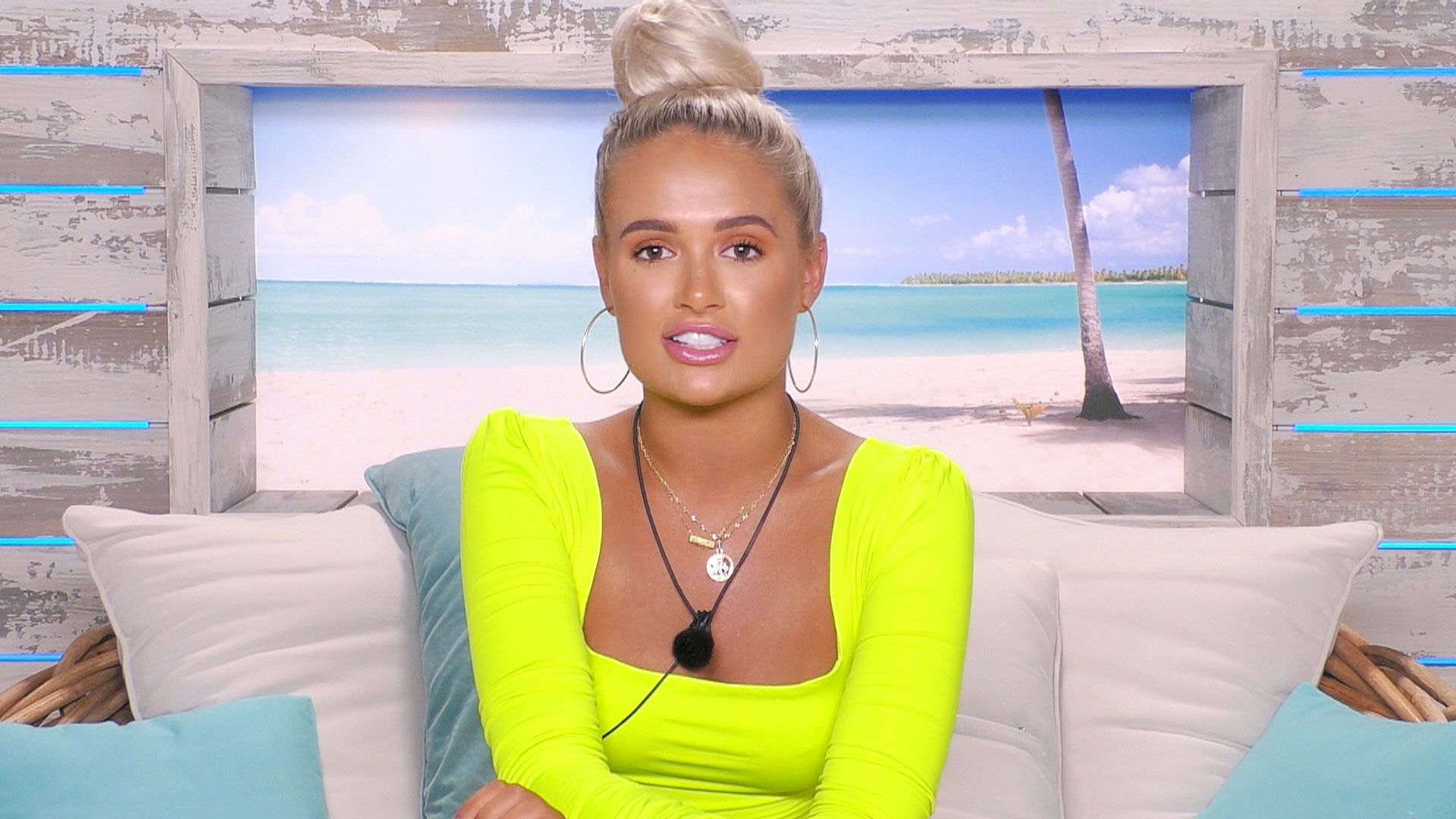 Image may contain: Love Island star signs, Gemini, Molly-Mae, Love Island, star sign, compatible, couple, Islander, cast, contestant, Sitting, Furniture, Couch, Pendant, Accessory, Accessories, Jewelry, Necklace, Human, Person