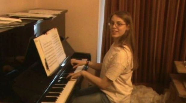 Image may contain: Upright Piano, Performer, Musician, Pianist, Leisure Activities, Piano, Musical Instrument, Human, Person
