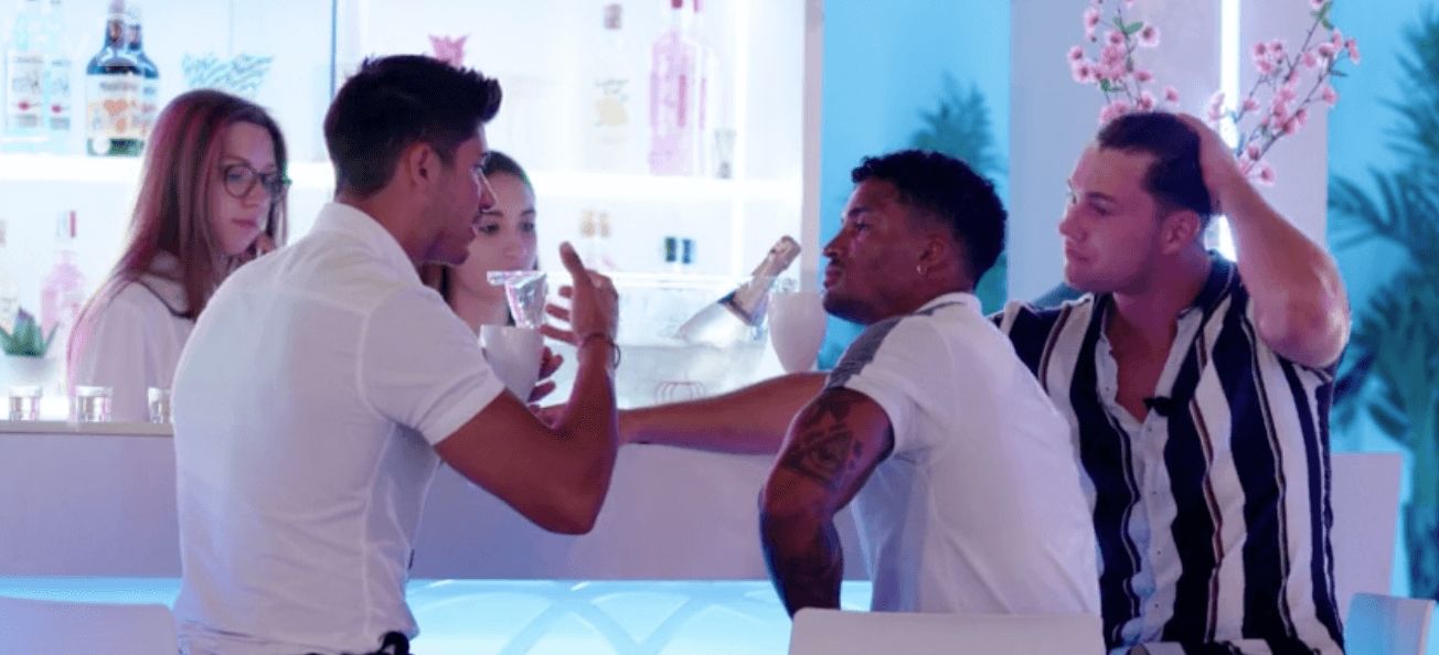 Image may contain: Love Island shop keeper, Love Island, barmaid, bar, serving, till, assistant, girl, shop, worker, girl, Anton, number, actor, fake, staged, producers, Dating, Face, Skin, Arm, Person, Human