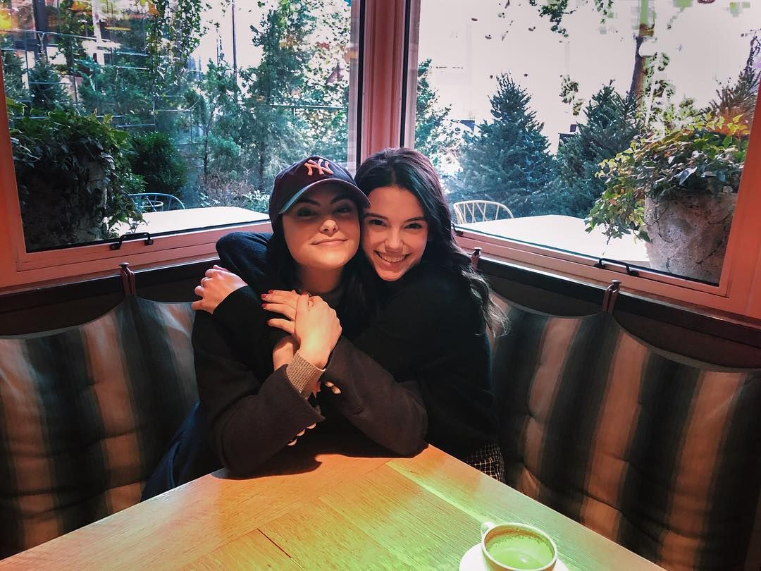Image may contain: Stranger Things 3 new cast, Stranger Things 3, cast, new, Netflix, Francesca Reale, Heather, lifeguard, Dating, Food, Meal, Tree, Pottery, Plant, Sitting, Table, Furniture, Coffee Cup, Cup, Wood, Apparel, Clothing, Cafe, Restaurant, Human, Person