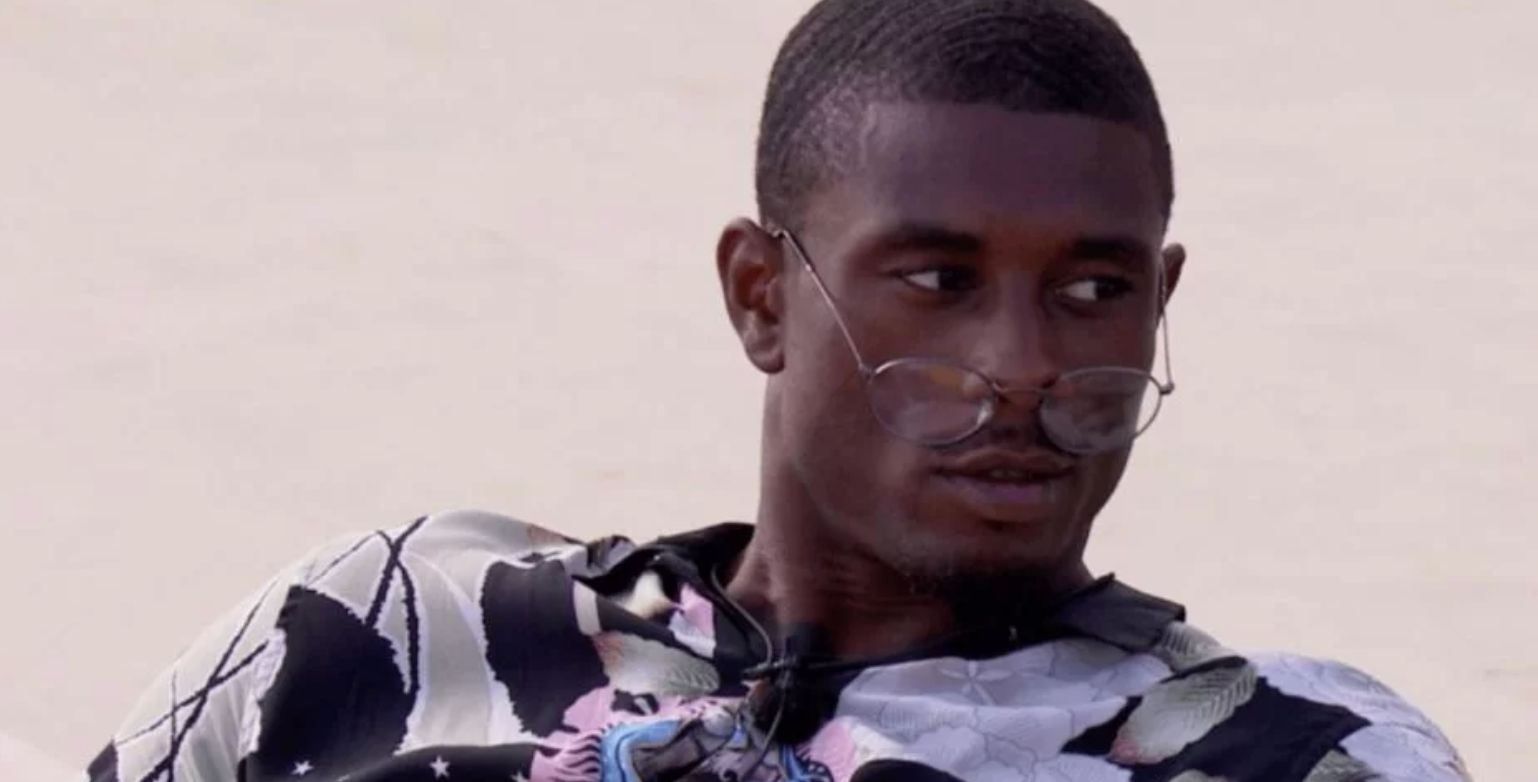 Image may contain: Ovie Soko net worth, Love Island, villa, Islander, Ovie, net worth, earnings, challenge, headlines, salary, basketball, team, player, per year, money, worth, Face, Person, Human, Accessories, Glasses, Accessory