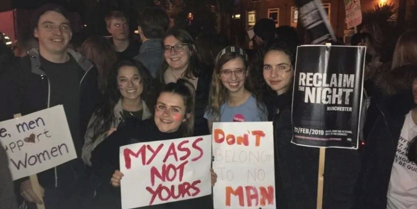 Image may contain: Female, People, Face, Protest, Text, Parade, Crowd, Person, Human