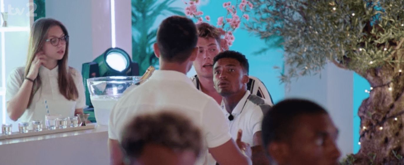 Image may contain: Love Island shop keeper, Love Island, barmaid, bar, serving, till, assistant, girl, shop, worker, girl, Anton, number, actor, fake, staged, last night, club, Flower, Blossom, People, Plant, Face, Apparel, Clothing, Human, Person
