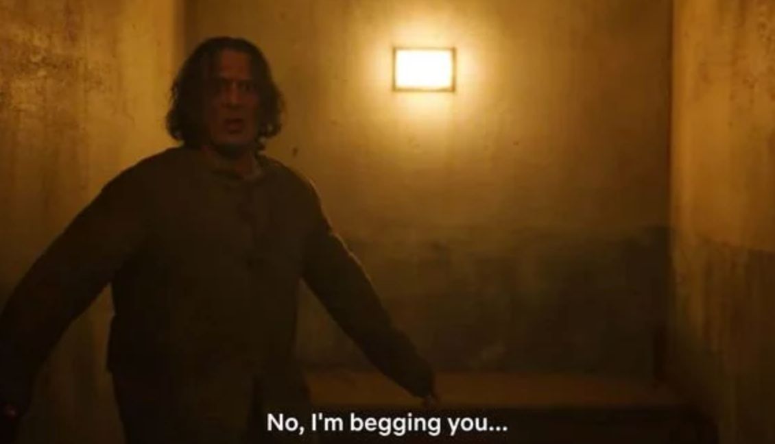 Image may contain: Stranger Things 3 end credit scene, post credits, Stranger Things 3, explained, theory, theories, ending, is Hopper dead, who, the American, door, spoilers, Netflix, finale, Stranger Things, Russian, prison, prisoner, Demogorgon, Upside Down, cell, Grand Theft Auto, Person, Human