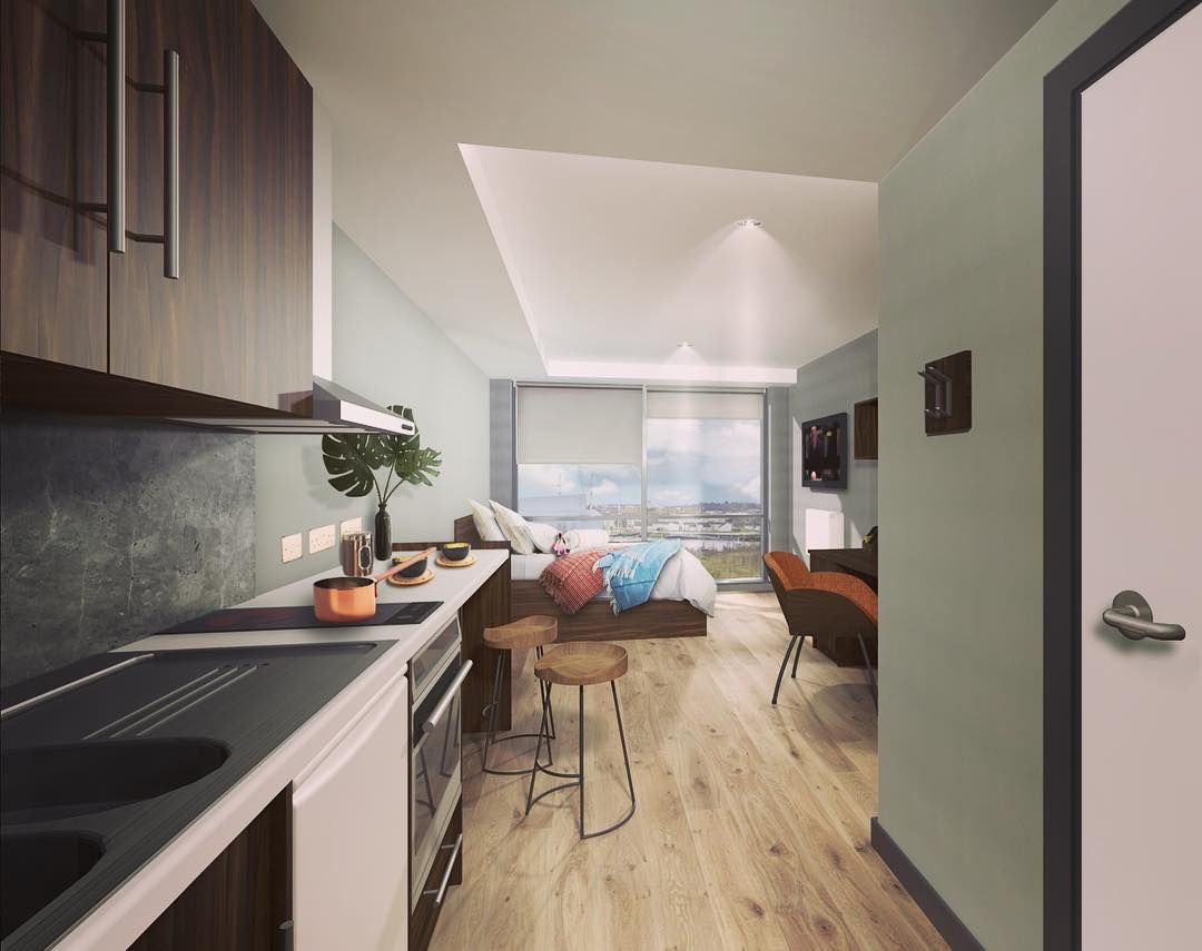 Image may contain: Interior Design, Kitchen, Floor, Hardwood, Chair, Furniture, Flooring, Wood, Indoors, Room