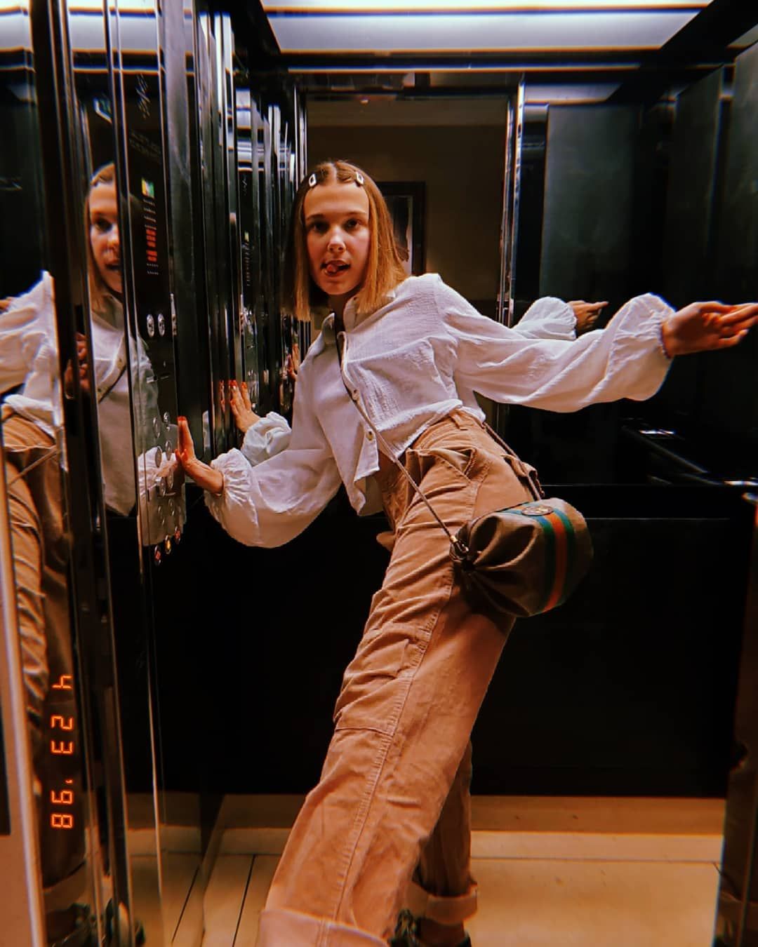 Image may contain: Stranger Things cast ages, Stranger Things, 3, cast, age, old, birthday, Millie Bobby Brown, Eleven, Leisure Activities, Costume, Person, Human, Apparel, Clothing