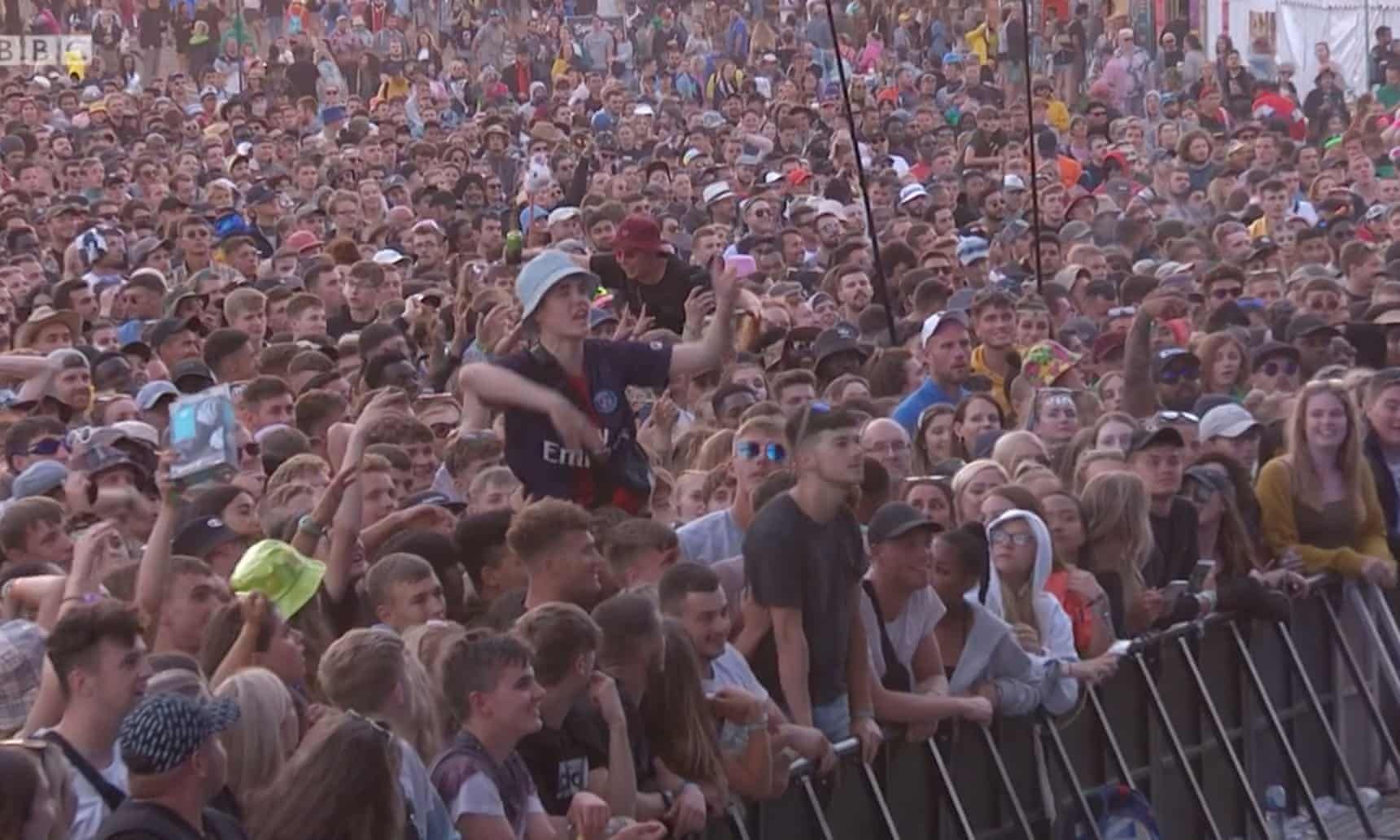 Image may contain: Alex Mann, Alex from Glastonbury, Glastonbury, Festival, Dave, rapping, boy, Glasto, stage, full video, Instagram, twitter, who, Alex, People, Festival, Accessory, Sunglasses, Accessories, Audience, Crowd, Human, Person