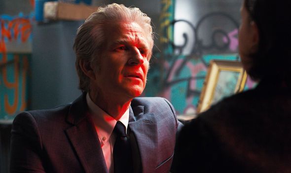 Image may contain: Stranger Things 3 end credit scene, post credits, Stranger Things 3, explained, theory, theories, ending, is Hopper dead, who, the American, door, spoilers, Netflix, finale, Stranger Things, Brenner, alive, Dr Martin Brenner, Photography, Photo, Portrait, Man, Crowd, Audience, Head, Clothing, Overcoat, Suit, Coat, Apparel, Face, Human, Person