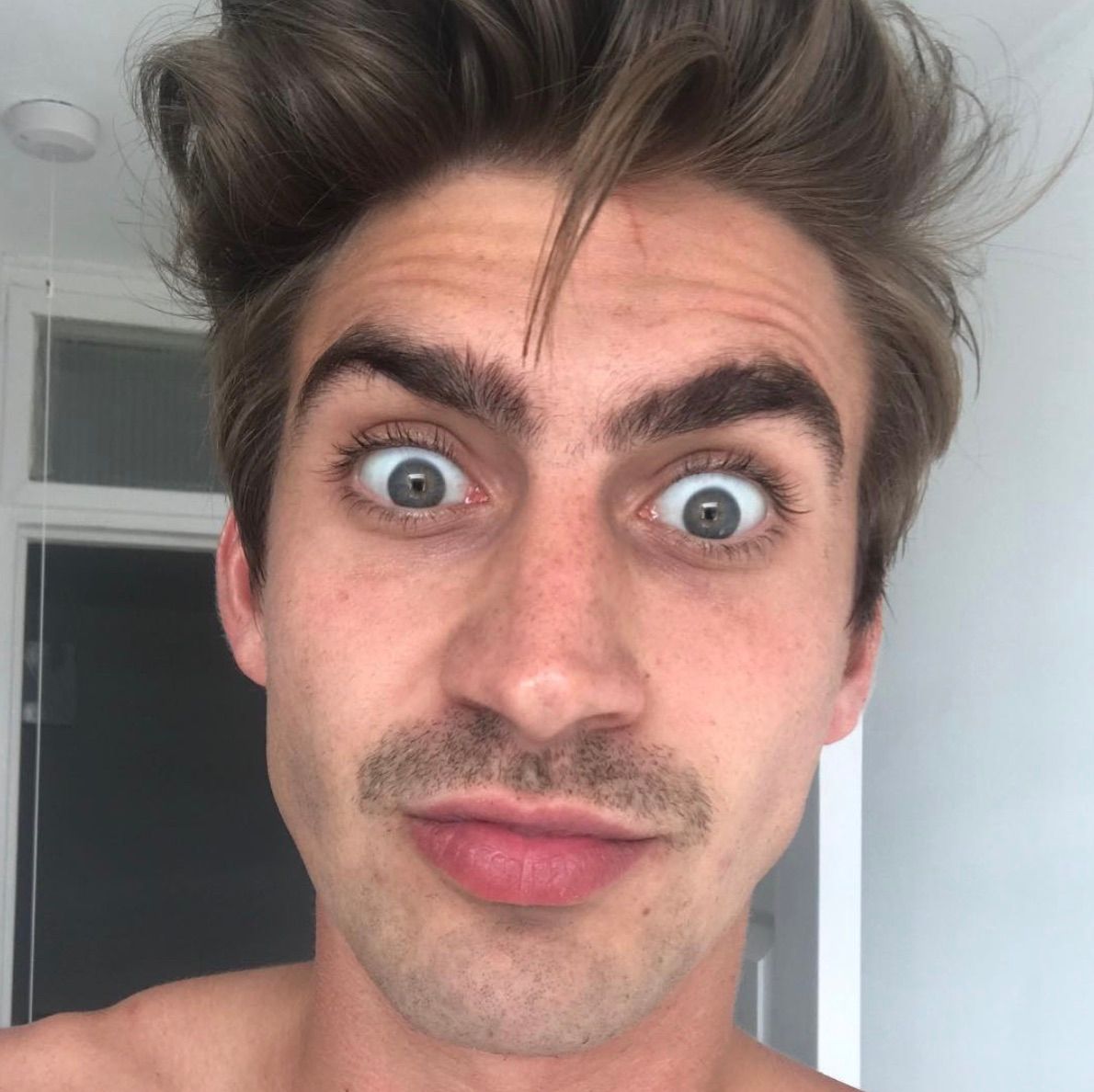 Image may contain: Photography, Photo, Portrait, Mustache, Face, Human, Person