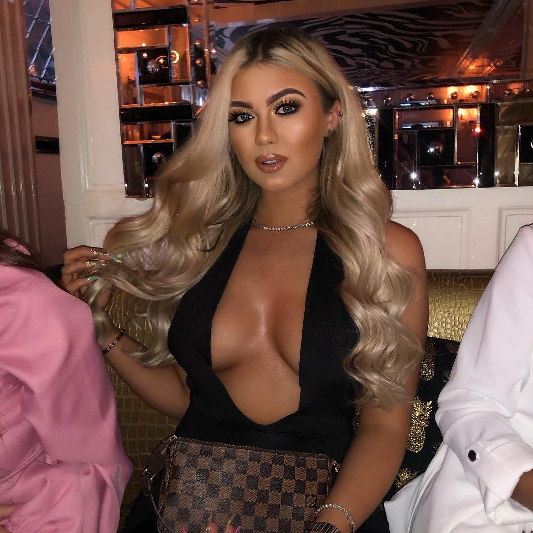 Image may contain: Casa Amor transformations, Casa Amor, Love Island, Belle Hassan, before, after, surgery, Pub, Bar Counter, Robe, Gown, Fashion, Evening Dress, Person, Human, Apparel, Clothing