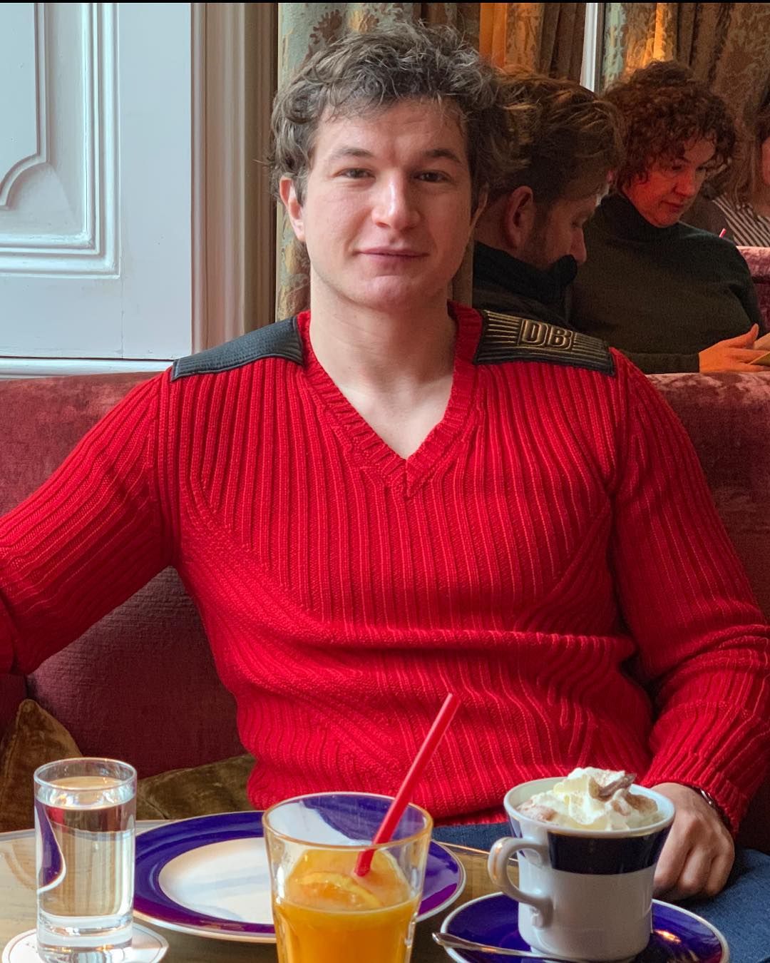 Image may contain: Stranger Things 3 new cast, Stranger Things 3, cast, new, Netflix, Alexei, Alec Utgoff, Restaurant, Beverage, Drink, Beer, Alcohol, Furniture, Couch, Food, Saucer, Pottery, Human, Person