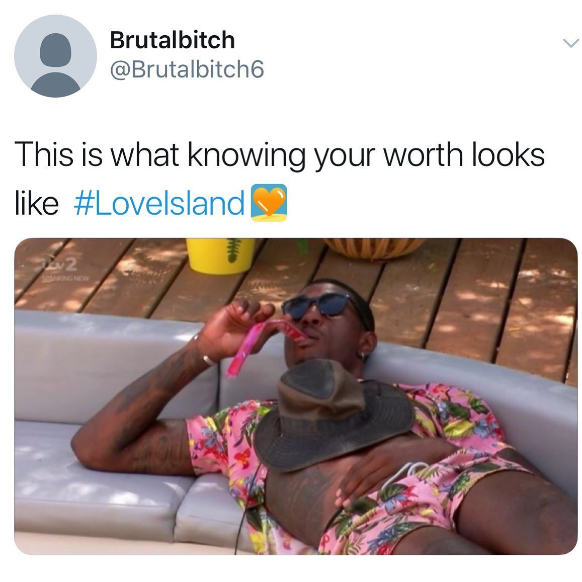 Image may contain: Love Island Ovie memes, Love Island, Ovie Soko, meme, reaction, twitter, funny, best, moment, ice lolly, shirt, hat, Skin, Human, Person, Accessory, Accessories, Sunglasses