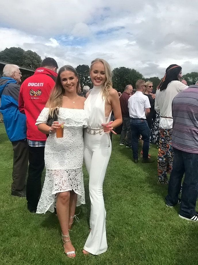 Image may contain: Wedding Gown, Outdoors, Denim, Jeans, Evening Dress, Wedding, Woman, Gown, Robe, Fashion, Female, Pants, Grass, Plant, Dress, Person, Human, Apparel, Clothing