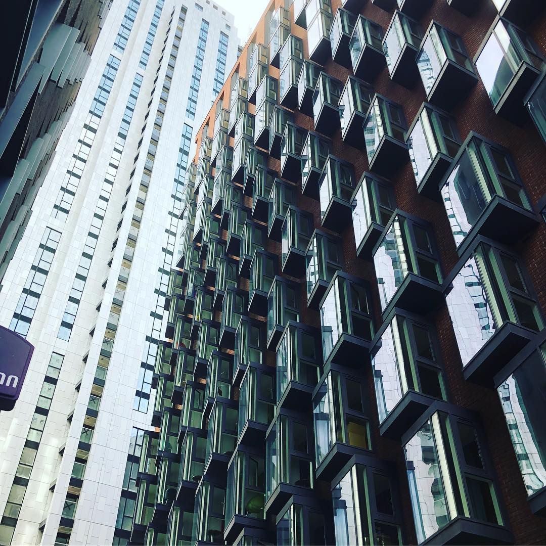 Image may contain: Window, Home Decor, Apartment Building, Office Building, Urban, Building, Town, High Rise, City