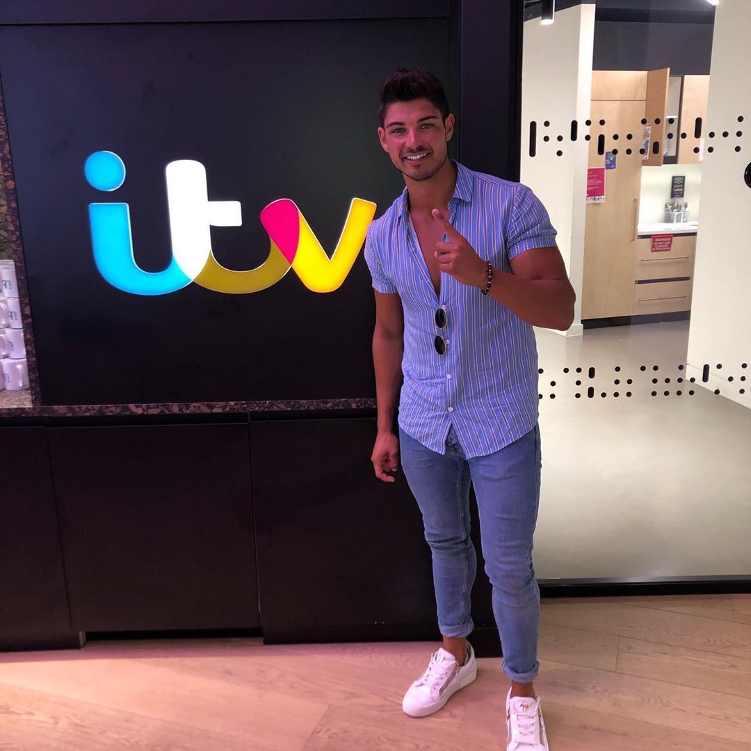 Image may contain: Love Island Instagrams, Love Island, Instagram, followers, ranking, 2019, Anton, Wood, Flooring, Pants, Long Sleeve, Sleeve, Human, Person, Apparel, Footwear, Shoe, Clothing