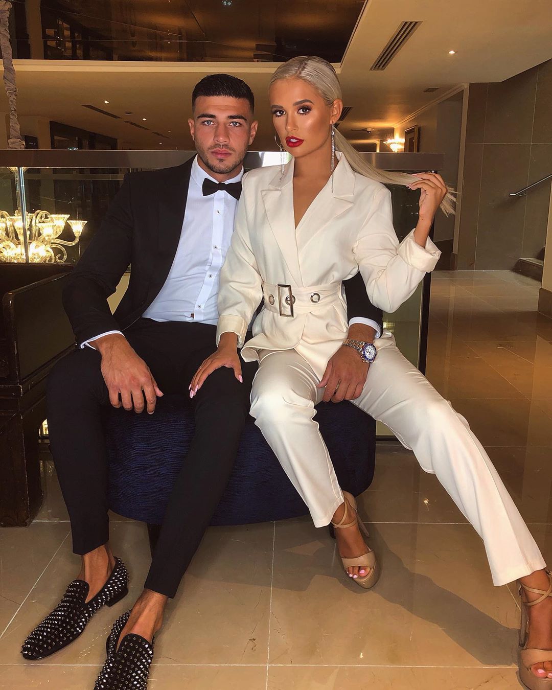 Image may contain: Molly-Mae and Tommy Ibiza, Molly-Mae Hague, Tommy Fury, Love Island, holiday, trip, Ibiza, Islanders, banned, Amy Hart, fake, Blazer, Jacket, Suit, Overcoat, Coat, Shoe, Footwear, Human, Person, Apparel, Clothing