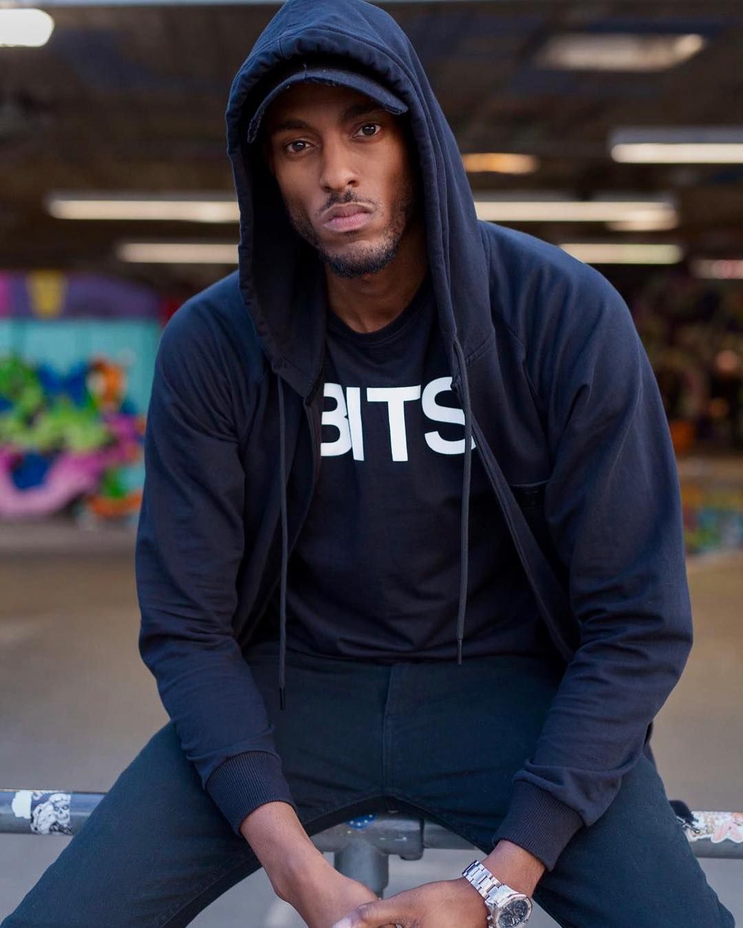 Image may contain: How to get swiped right, Stefan-Pierre Tomlin, Tinder, dating app, Bumble, hinge, pictures, bio, how to, get matches, swipe, right, tips, most swiped man, top matches, Coat, Jacket, Hoodie, Hood, Person, Human, Sweater, Sweatshirt, Clothing, Apparel