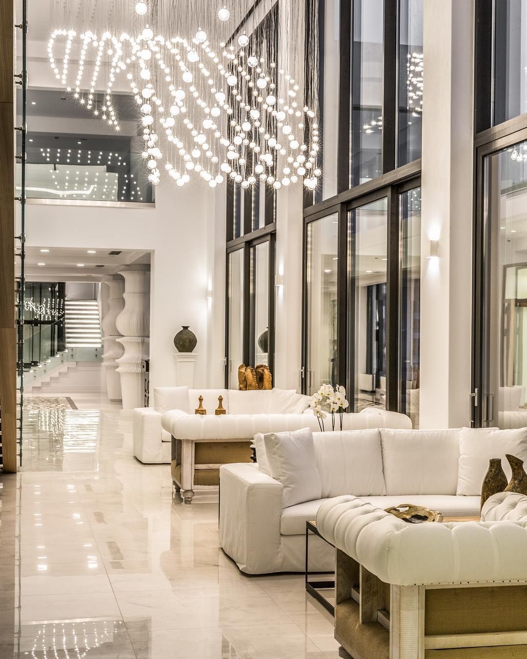 Image may contain: Abaton Island resort, Celebs Go Dating, final, Abaton Island Resort & Spa, Crete, Greece, Abaton, hotel, Island, lobby, interior, Coffee Table, Building, Housing, Lamp, Chandelier, Flooring, Table, Living Room, Interior Design, Furniture, Room, Indoors, Lobby