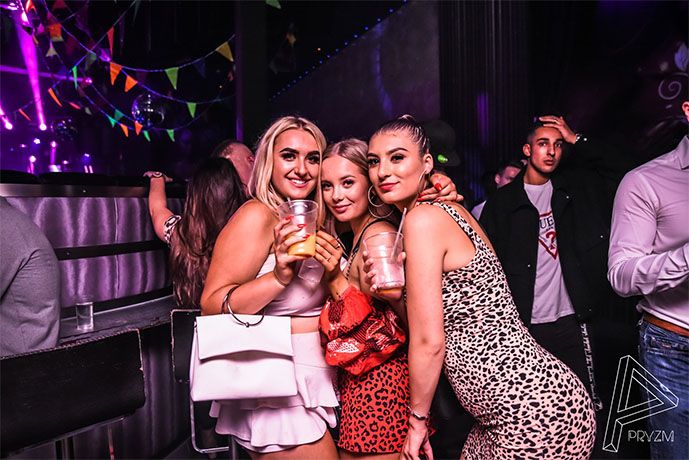 Image may contain: Disco, Party, Night Club, Club, Person, Human