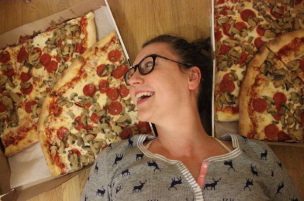 Image may contain: Face, Accessory, Accessories, Glasses, Person, Human, Pizza, Food