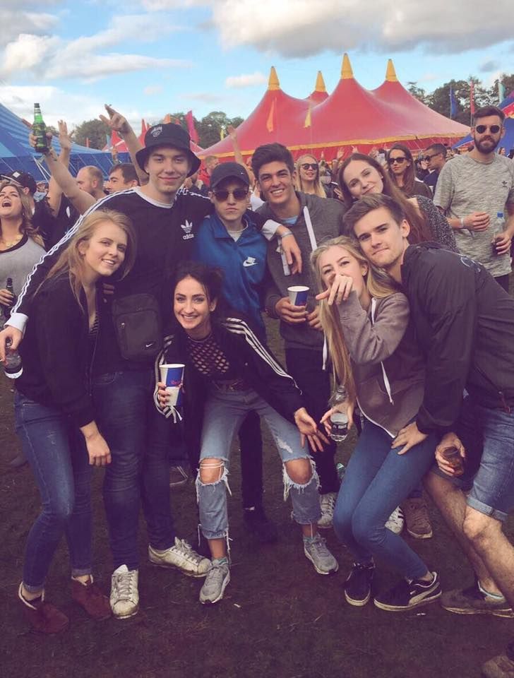 Image may contain: Festival, Costume, Pants, People, Audience, Female, Party, Smile, Crowd, Face, Human, Person, Shoe, Footwear, Apparel, Clothing