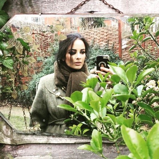 Image may contain: Great British Bake Off 2019, Helena Garcia, Helena, cast, contestants, lineup, Instagram, GBBO, Bake Off, 2019, start date, Channel 4, Forest, Woodland, Land, Leaf, Girl, Potted Plant, Jar, Pottery, Vase, Clothing, Apparel, Tree, Woman, Animal, Zoo, Face, Gardening, Worker, Gardener, Female, Nature, Yard, Vegetation, Plant, Garden, Person, Human, Outdoors