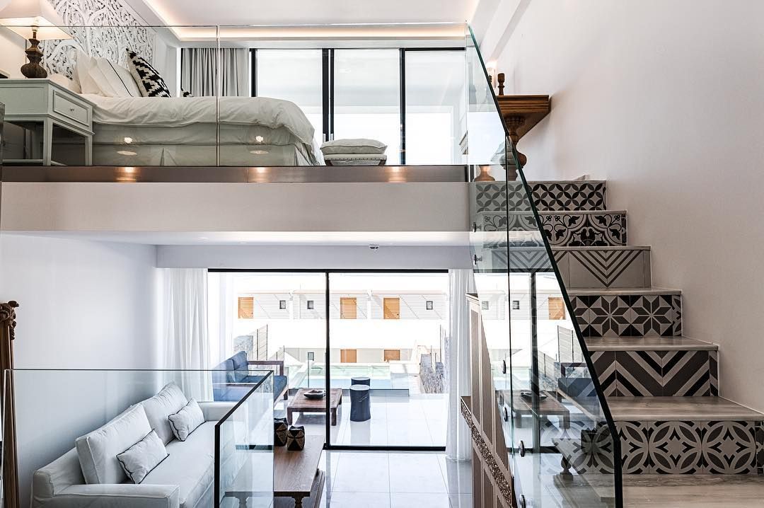 Image may contain: Abaton Island resort, Celebs Go Dating, final, Abaton Island Resort & Spa, Crete, Greece, Abaton, hotel, Island, room, bedroom, villa, suite, luxury, inside, Furniture, Couch, Staircase, Indoors, Building, Housing, Loft
