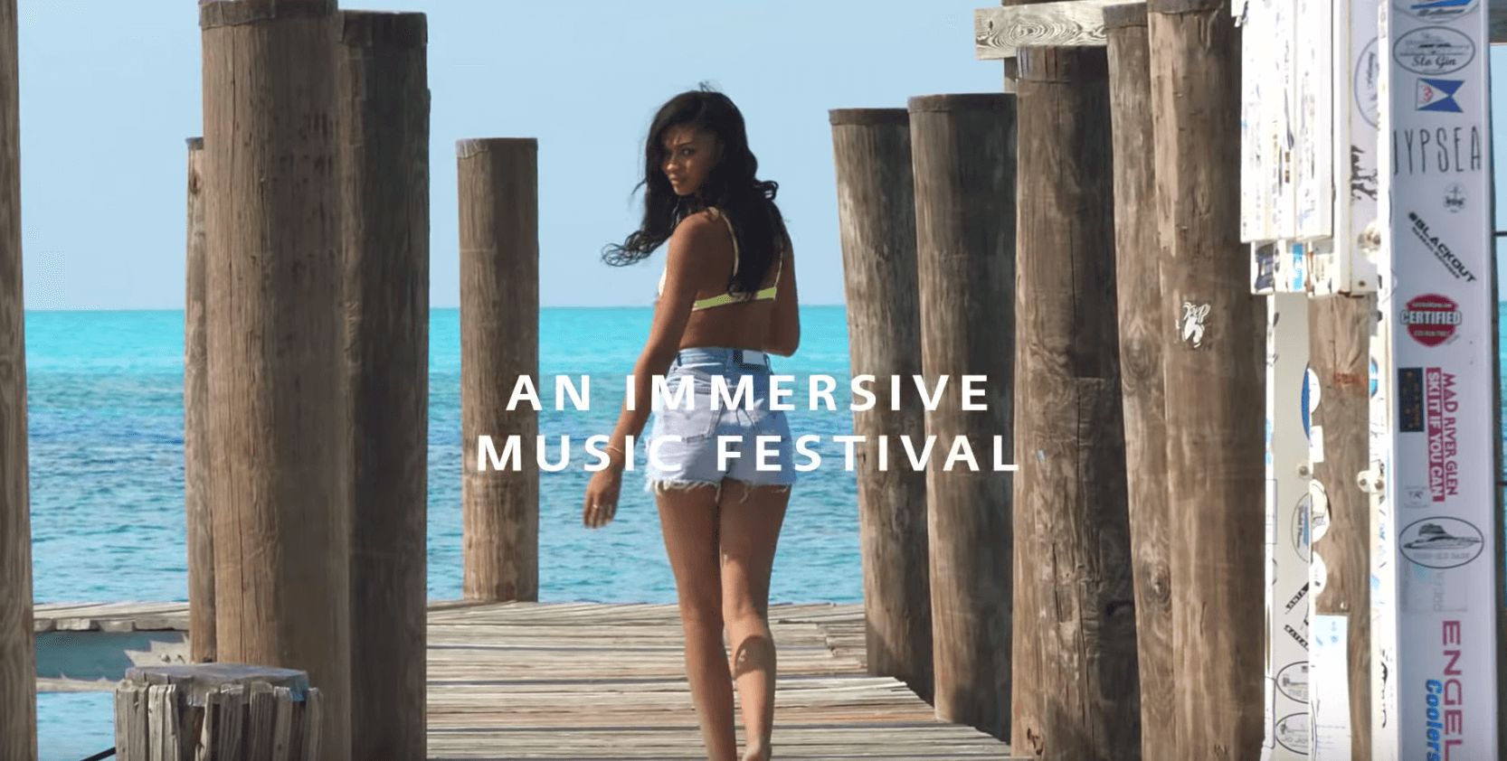 Image may contain: The I-Land, Netflix, Fyre Festival, horror, series, trailer, cast, new, show, Girl, Path, Woman, Boardwalk, Bridge, Building, Female, Pier, Port, Dock, Shorts, Clothing, Apparel, Water, Waterfront, Person, Human