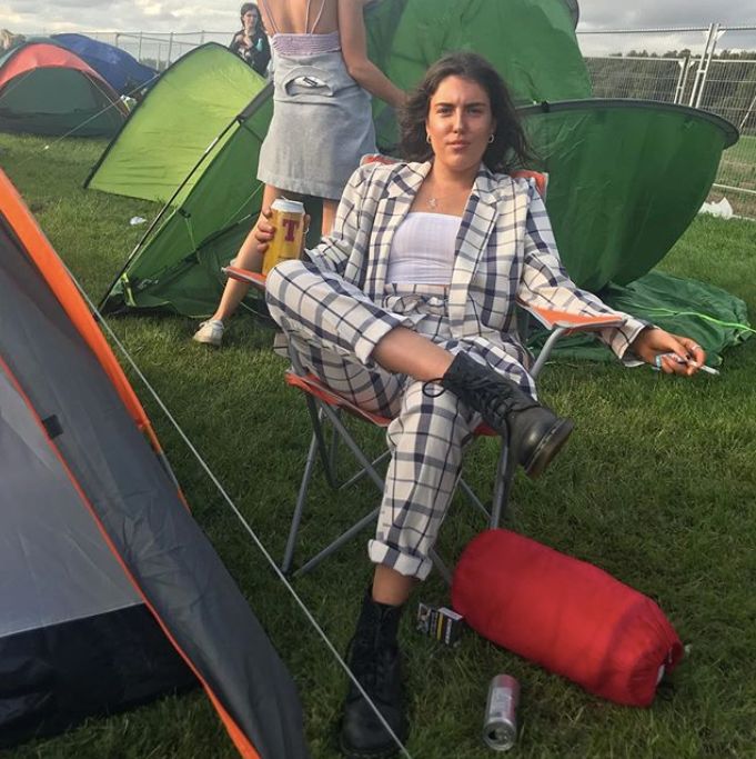 Image may contain: Grass, Plant, Chair, Furniture, Mountain Tent, Leisure Activities, Tent, Camping, Human, Person, Nature, Shelter, Countryside, Rural, Outdoors, Building