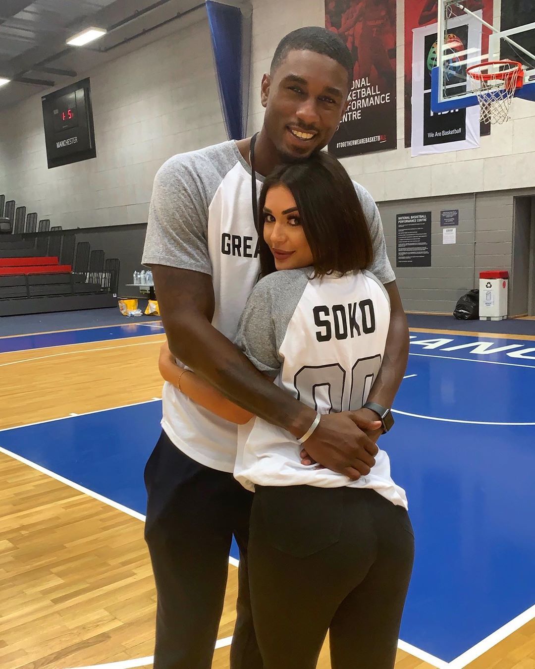 Image may contain: Indoors, Basketball, Team Sport, Team, Sphere, Sports, Sport, Clothing, Apparel, Shorts, People, Human, Person