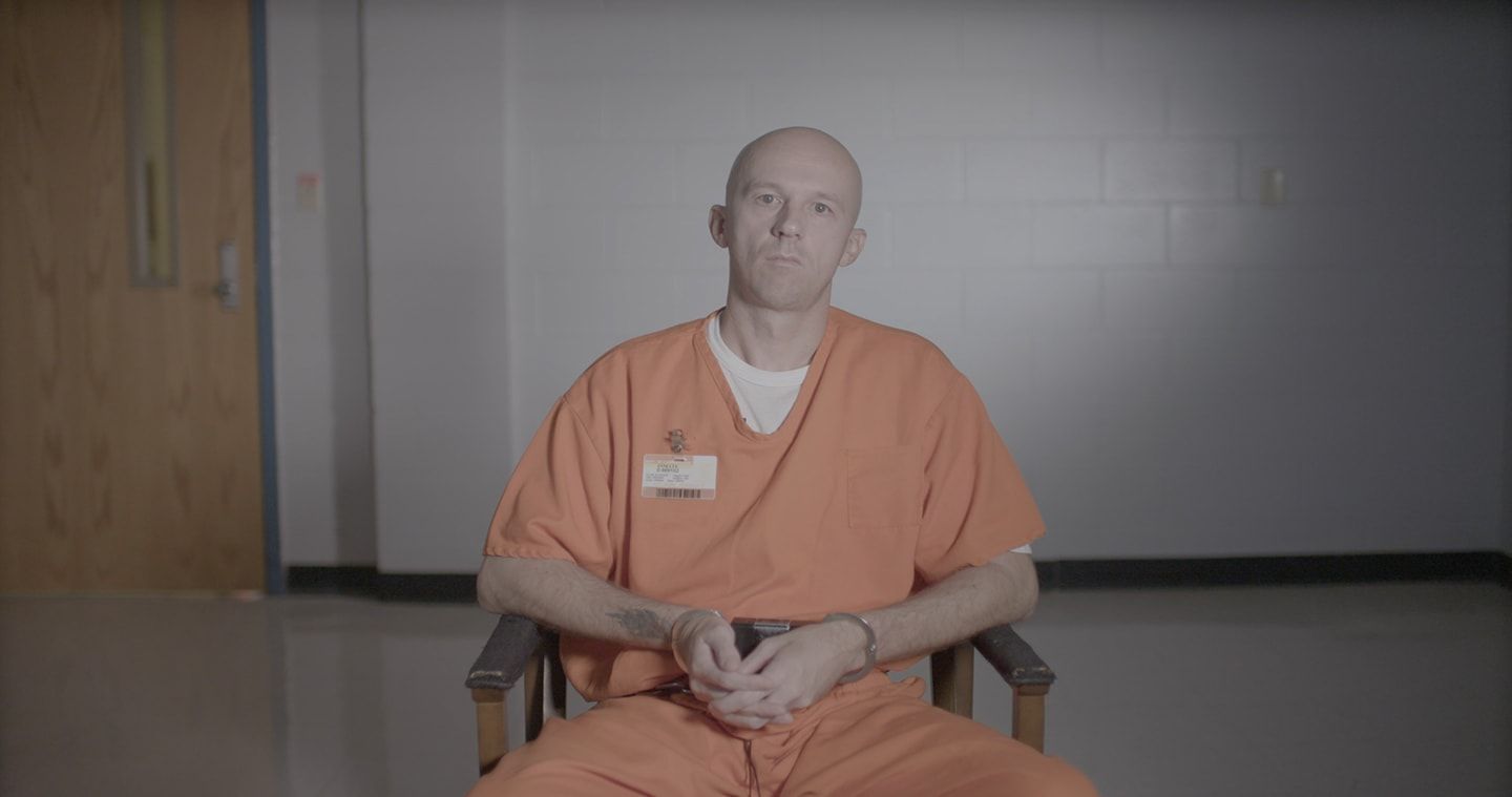 Image may contain: I Am a Killer, Joshua Nelson, Florida state prison, Netflix, death row, prison, Florida, inmate, Patient, Wood, Furniture, Chair, Human, Person