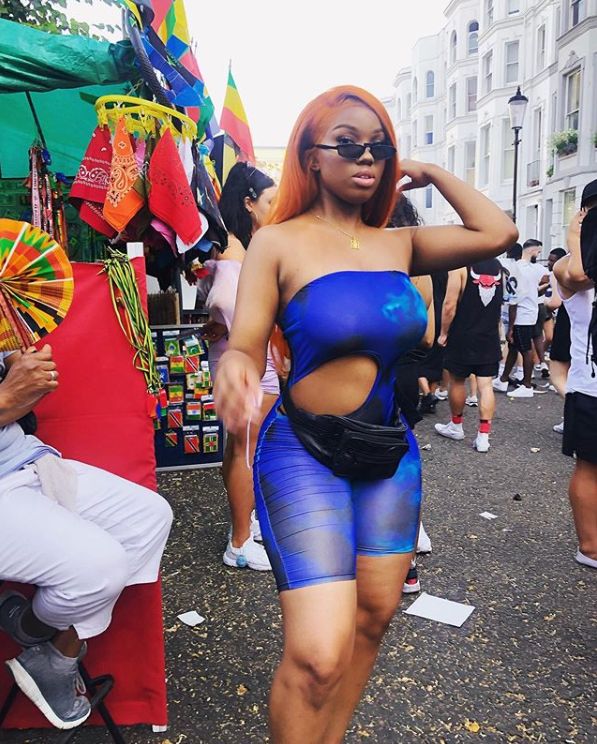 Image may contain: People, Crowd, Festival, Sunglasses, Accessories, Accessory, Shorts, Clothing, Footwear, Shoe, Apparel, Costume, Person, Human