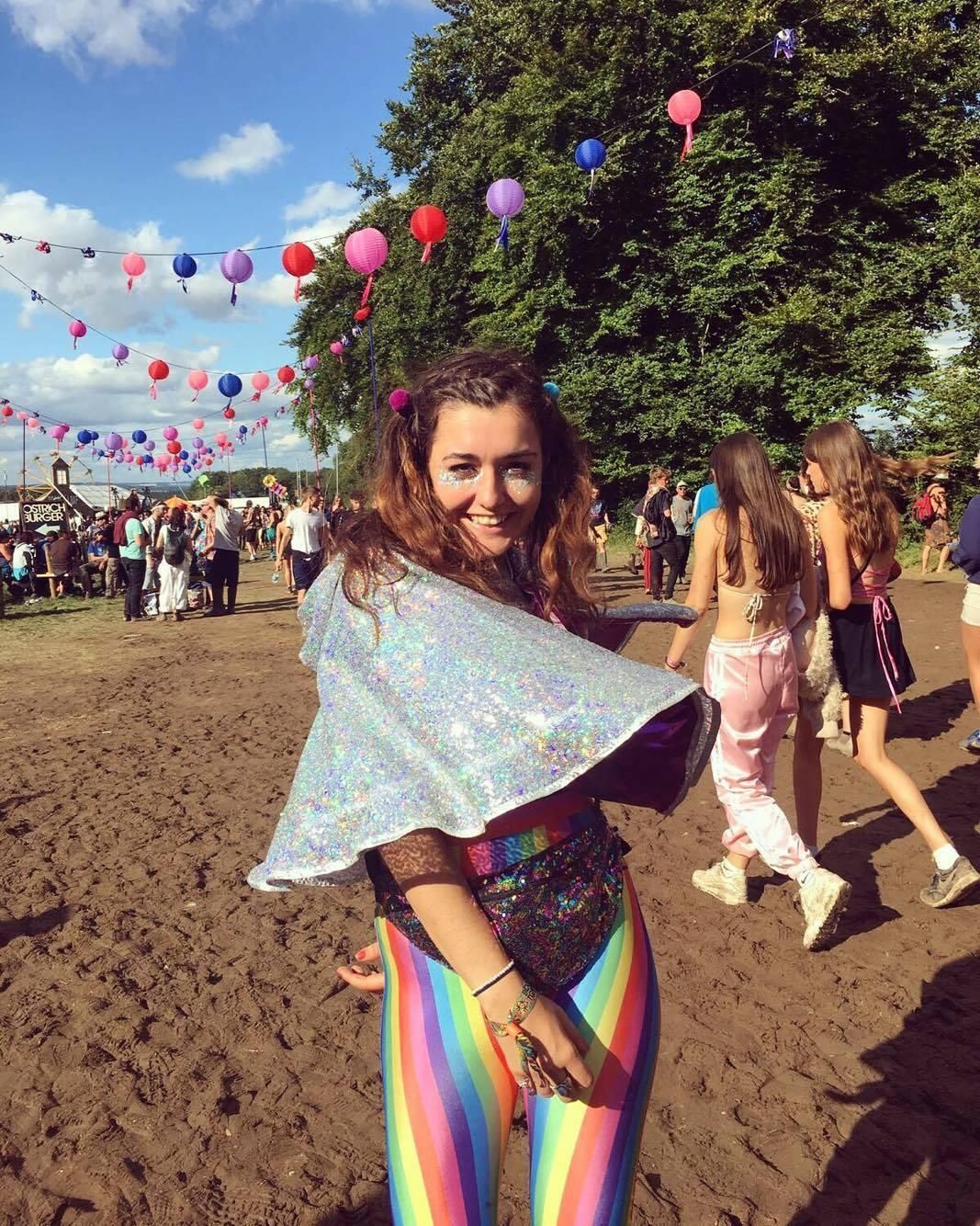 Image may contain: Is Boomtown Fair 2019 cancelled, Boomtown, 2019, cancelled, still going ahead, weather, warnings, on, location, date, latest, news, People, Outdoors, Vacation, Leisure Activities, Shoe, Footwear, Shorts, Female, Apparel, Clothing, Crowd, Festival, Human, Person