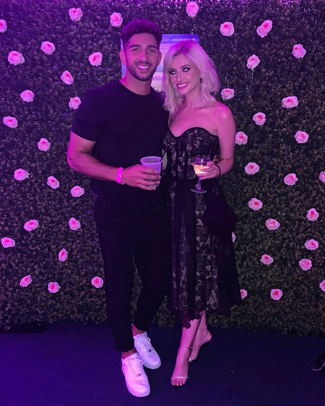 Image may contain: Love Island, gossip, news, latest, rumours, Amy, Marvin, dating, Photo, Photography, Portrait, Woman, Light, Costume, Girl, Footwear, Shoe, Female, Petal, Blossom, Flower, Plant, Face, Human, Person, Purple, Apparel, Clothing, Dress