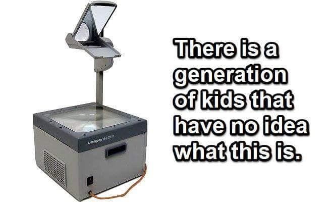 Image may contain: 90s kid memes, school, uk, meme, tweet, OHP, overhead projector, school, assembly, reaction, funny, 00s, 90s, nostalgic, Projector, Machine