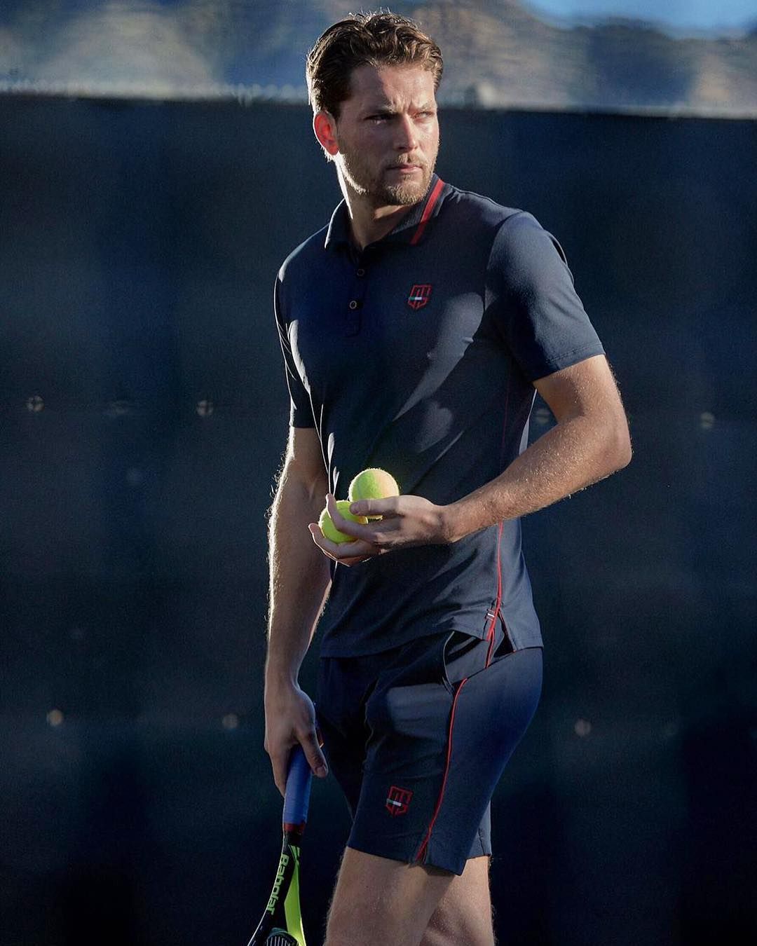 Image may contain: Caroline Flack's boyfriend, Lewis Burton, tennis, player, model, Caroline Flack, boyfriend, new, latest, news, gossip, ex, Instagram, age, Love Island Sphere, Racket, Tennis Racket, Sport, Tennis, Sports, Person, Human