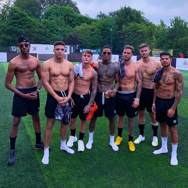 Image may contain: How to get swiped right, Stefan-Pierre Tomlin, Tinder, dating app, Bumble, hinge, pictures, bio, advice, how to, get matches, swipe, right, tips,Sports, Sport, Clothing, Apparel, Shorts, Crowd, Huddle, Accessory, Accessories, Sunglasses, People, Person, Human